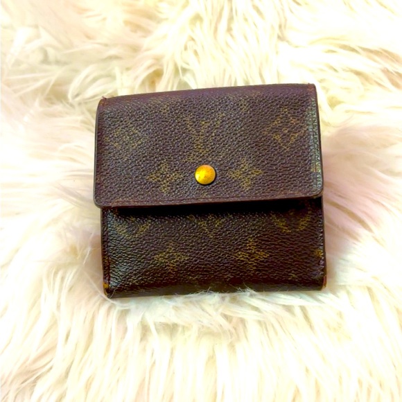 Louis Vuitton Double Mono Snap Wallet. Serial #: TH1917 - Picture 1 of 12